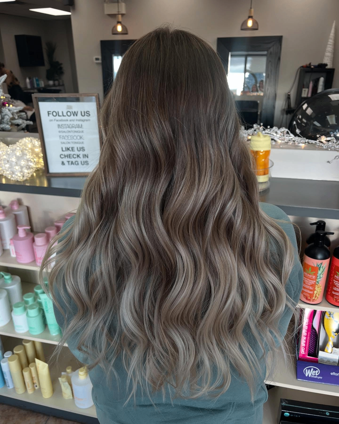 Cool brunette waves photographed inside the salon